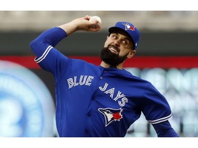 Toronto Blue Jays pitcher Matt Shoemaker throws against the Minnesota Twins in the first inning of a baseball game Monday, April 15, 2019, in Minneapolis.