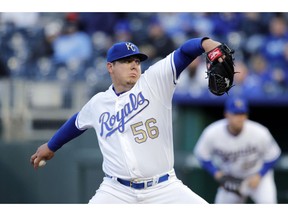 Kansas City Royals pitcher Brad Keller throws to a Cleveland Indians batter in the first inning of a baseball game at Kauffman Stadium in Kansas City, Mo., Friday, April 12, 2019.