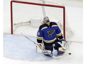 St. Louis Blues goaltender Jordan Binnington reacts after giving up a goal to Winnipeg Jets' Patrik Laine, of Finland, during the second period in Game 3 of an NHL first-round hockey playoff series Sunday, April 14, 2019, in St. Louis.