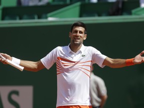 Serbia's Novak Djokovic reacts as he plays Russia's Daniil Medvedev during their quarterfinal match of the Monte Carlo Tennis Masters tournament in Monaco, Friday, April 19, 2019.