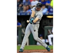 Seattle Mariners' Jay Bruce hits a solo home run off Kansas City Royals starting pitcher Jakob Junis during the first inning of a baseball game at Kauffman Stadium in Kansas City, Mo., Tuesday, April 9, 2019.