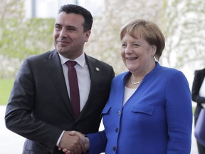 German Chancellor Angela Merkel welcomes North Macedonia Prime Minister Zoran for a meeting of Balkan leaders at the chancellery in Berlin, Monday, April 29, 2019. German Chancellor Angela Merkel and French President Emmanuel Macron are hosting the meeting to restart deadlocked talks between Serbia and Kosovo.