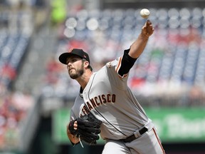 San Francisco Giants starting pitcher Drew Pomeranz delivers a pitch during the first inning of a baseball game against the Washington Nationals, Thursday, April 18, 2019, in Washington.