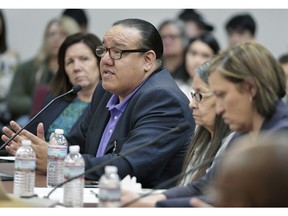 Charles Walker, left, representing the Standing Rock Sioux Tribe, testifies on 4-16-2019 in front of the House Administration Subcommittee on Elections at a field hearing in Fort Yates, N.D., related to voting rights and election administration accountability.