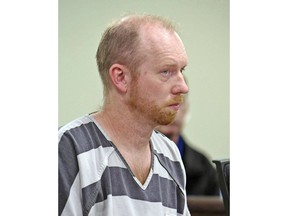 FILE - In this Friday, April 5, 2019 file photo, Chad Isaak listens while being charged with four counts of class AA felony murder in district court in Mandan, N.D. Isaak, a chiropractor, is charged with felony murder in the April 1 deaths of RJR Maintenance and Management co-owner Robert Fakler and three workers in Mandan.