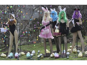 This Monday, April 8, 2019 photo shows an Easter display in Clifton, N.J. A New Jersey woman unhappy with her neighbor's racy Easter display used some garden shears to damage it. But the display's owner says it will soon be back up. The display at a dental office in Clifton featured five mannequins dressed in lingerie, all holding Easter baskets and surrounded by Easter eggs. It had drawn mixed reviews from neighbors, as well as passers-by who stopped to take photos.
