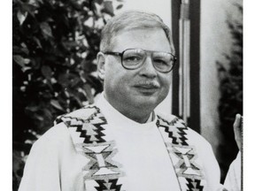 FILE - This 1989 file photo shows Father Arthur Perrault in Albuquerque, N.M. A jury has found a former priest guilty of sexually abusing a boy nearly three decades ago at a veterans' cemetery and Air Force base in New Mexico. The jury reached the verdict Wednesday, April 10, 2019, against Perrault, who had vanished from New Mexico in 1992. He was returned to the United States in September from Morocco to face charges of aggravated sexual abuse and abusive sexual contact. (The Albuquerque Journal via AP, File)