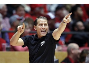 FILE - In this Jan. 5, 2019, file photo, Nevada coach Eric Musselman gives instructions to his players from the sideline during the second half of the team's NCAA college basketball game against New Mexico in Albuquerque, N.M. Arkansas has hired Musselman as its next men's basketball coach. Razorbacks athletic director Hunter Yurachek announced Musselman's hiring Sunday, April 7, on Twitter.
