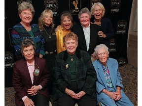 FILE - In this Oct. 19, 1999, file photo, eight founders of the Ladies Professional Golf Association (LPGA) pose at a celebration of the association's 50th anniversary in New York. Back row from left are Marilynn Smith, Marlene Hagge, Alice Bauer, Louise Suggs and Betty Jameson. Front row from left are Bettye Sanoff, Shirley Spork and Patty Berg. Marilynn Smith died Tuesday, April 9, 2019. She was 89.