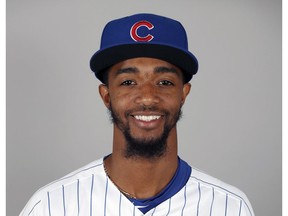 FILE - This is a 2018, file photo showing Carl Edwards Jr. of the Chicago Cubs baseball team. Major League Baseball is investigating a racist message sent to Chicago Cubs reliever Carl Edwards Jr. on social media this month.