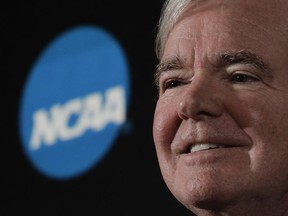 FILE - In this March 29, 2018, file photo, NCAA President Mark Emmert speaks during a news conference in San Antonio. Emmert says a judge's recent ruling in a federal antitrust lawsuit again reinforced that college athletes should be treated as students not employees. Emmert spoke to The Associated Press on Wednesday, April 3, at U.S. Bank Stadium, the site of the men's basketball Final Four, making his first public comments since last month's decision. Judge Claudia Wilken ruled the NCAA did violate antitrust laws and cannot prohibit schools from providing more benefits to athletes as long as they are tethered to education.