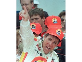 FILE - In this Feb. 19, 1989, file photo, Darrell Waltrip celebrates in Victory Lane after winning the Daytona 500 auto race in Daytona Beach, Fla.  Waltrip will soon Boogity! Boogity! Boogity! his way into retirement. Everyone yearns for an opportunity to say farewell on their own terms, so with that, Waltrip should bring his second career as a NASCAR broadcaster to a close and squeeze out his classic catchphrase on his own terms as Fox Sports closes its portion of the broadcast deal.