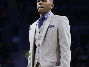 FILE - In this Feb. 28, 2016, file photo, Toronto Raptors assistant coach Jerry Stackhouse is seen during the second half of an NBA basketball game against the Detroit Pistons, in Auburn Hills, Mich. A person familiar with the situation says Vanderbilt has hired Memphis Grizzlies assistant and former NBA All-Star Jerry Stackhouse as its basketball coach. The person spoke on the condition of anonymity Friday, April 5, 2019, because Vanderbilt has not commented on its coaching search.