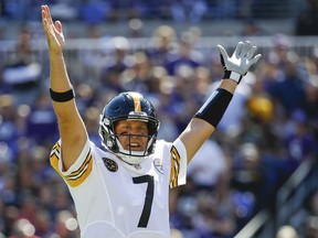 FILE - In this Oct. 1, 2017, file photo, Pittsburgh Steelers quarterback Ben Roethlisberger (7) celebrates a touchdown by running back Le'Veon Bell during the first half of an NFL football game against the Baltimore Ravens in Baltimore. The Pittsburgh Steelers have reiterated repeatedly during an eventful offseason that quarterback Ben Roethlisberger remains the team's unquestioned leader. They've handed him a new deal to prove it. The Steelers and the two-time Super Bowl winner agreed to terms on a contract extension Wednesday, April 24, 2019,  that will keep Roethlisberger in Pittsburgh through the 2021 season.