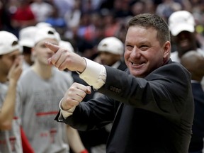 FILE - In this March 30, 2019, file photo, Texas Tech head coach Chris Beard celebrates after the team's win against Gonzaga during the West Regional final in the NCAA men's college basketball tournament, in Anaheim, Calif. Beard was named The Associated Press Coach of the Year, Thursday, April 4, 2019.