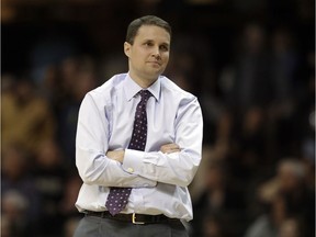 FILE - In this Jan. 20, 2018, file photo, LSU coach Will Wade watches from the sideline during the second half of the team's NCAA college basketball game against Vanderbilt in Nashville, Tenn. LSU officials say their first meeting with suspended coach Wade has taken place but that there is not yet a resolution regarding Wade's long-term status. A written statement from the university says "it is unlikely LSU makes any decisions today regarding Coach Wade."