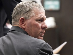 FILE - In this Dec. 3, 2012 file photo, former baseball player Lenny Dykstra sits during his sentencing for grand theft auto in Los Angeles. Former baseball star Lenny Dykstra has admitted he illegally rented out rooms in a New Jersey house owned by his corporation. Dykstra pleaded guilty in municipal court Tuesday, April 2, 2019, to violating city housing codes in Linden by running a rooming house without permission.