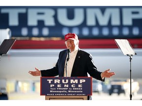 FILE - In this Sunday, Nov. 6, 2016 file photo, Republican presidential candidate Donald Trump addresses the crowd during a campaign stop at the Minneapolis International Airport. On Monday, April 15, 2019, President Trump is travelling to Minnesota, where he lost to Hillary Clinton by fewer than 45,000 votes in 2016, but his re-election campaign is also targeting New Mexico, Nevada, and New Hampshire _ all states where he trailed by under 100,000 votes.