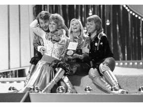 FILE - In this April 6, 1974 file photo, Swedish pop group ABBA celebrate winning the 1974 Eurovision Song Contest on stage at the Brighton Dome in England. From left are Benny Andersson, Anni-Frid Lyngstad (Frida), Agnetha Faltskog, and Bjorn Ulvaeus. In their song "One Last Summer," they write the sentimental detail, "In the tourist jam, round the Notre-Dame/Our last summer/Walking hand in hand."