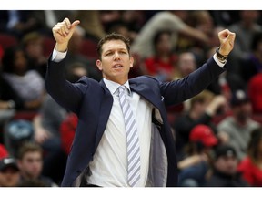 FILE - In this March 12, 2019, file photo, Los Angeles Lakers coach Luke Walton gestures to players during the second half of an NBA basketball game against the Chicago Bulls in Chicago. The Lakers say they have mutually agreed to part ways with Walton after three losing seasons. Lakers general manager Rob Pelinka announced Walton's departure Friday, April 12, 2019.