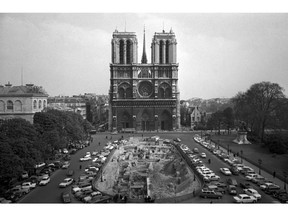 FILE - This April 18, 1967, file photo, shows the Notre Dame Cathedral in Paris. Art experts around the world reacted with horror to news of the fire that ravaged cathedral on Monday, April 15, 2019. One shell-shocked art expert is calling the beloved Gothic masterpiece 'one of the great monuments to the best of civilization.'