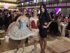 Choreographer Melanie Hamrick poses with dancers at the gala of Youth America Grand Prix, the world's largest ballet scholarship competition, on Thursday, April 18, after the U.S. premiere of her new ballet, "Porte Rouge" (Red Door), based on classic Rolling Stones tunes arranged by her partner, Mick Jagger. The Stones frontman, recovering from medical treatment, watched from backstage and addressed the audience briefly via microphone before the show.