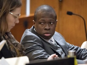 FILE - In this Tuesday, March 26, 2019, file photo, defendant Chanel Lewis, right, is seated at the defense table at Supreme Court in the Queens Borough of New York, on the sixth day of his retrial for the August 2016 murder of Karina Vetrano. On Monday, April 1, 2019, a jury convicted Lewis of the murder. A previous trial ended in a hung jury.