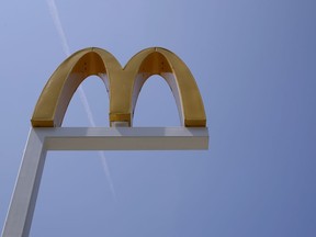 FILE- This Aug. 8, 2018, file photo shows the logo of McDonald's at a restaurant in Chicago. McDonald's Corp. reports financial results Tuesday, April 30, 2019.