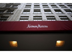 FILE - This March, 11, 2009, file photo, shows the Neiman Marcus store in Dallas. Neiman Marcus Group is getting serious about the fast growing secondhand luxury business. The Dallas-based luxury retailer said Wednesday, April 17, 2019, that it has acquired a minority stake in Fashionphile LLC, an online seller of preowned accessories.