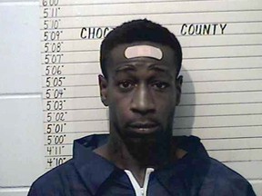This undated booking photo provided by Choctaw County Sheriff's Office shows William DeVaughn Smith. The Oklahoma State Bureau of Investigation said Saturday, April 27, 2019, that injuries suffered by three children when Oklahoma police fired at Smith, a robbery suspect in a pickup truck, are non-life threatening. Smith is suspected in an April 11 armed robbery at a Pizza Hut in Hugo, Okla. He hasn't been formally charged.  (Choctaw County Sheriff's Office via AP)