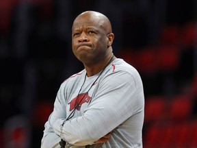 FILE - In this March 15, 2018, file photo, Arkansas head coach Mike Anderson watches practice at the NCAA college basketball tournament in Detroit. Anderson was hired as St. John's coach on Friday, April 19, 2019, after he was fired by Arkansas last month. He also had head coaching stints at Missouri and UAB before leading the Razorbacks to five postseason appearances and a 169-102 record in eight seasons.