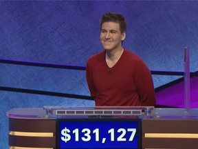 FILE - This file image made from video and provided by Jeopardy Productions, Inc. shows "Jeopardy!" contestant James Holzhauer on an episode that aired on April 17, 2019. On his 14th appearance Tuesday, April 23, 2019, Holzhauer eclipsed the $1 million mark in winnings. (Jeopardy Productions, Inc. via AP)