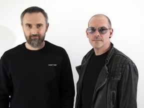 This April 12, 2019 photo shows musicians Noel Hogan, left, and Fergal Lawler, of the rock group The Cranberries, posing for a portrait in New York to promote their eighth and final album, "In the End."