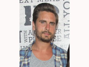 FILE - This Aug. 9, 2014 file photo shows Scott Disick at the "Party Under The Stars" benefit in New York. Disick, a frequent face on "Keeping Up With the Kardashians," has been greenlighted to star in "Flip It like Disick," which will follow him on his adventures remodeling and selling celebrity real estate.