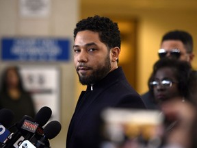 FILE - This March 26, 2019 file photo shows actor Jussie Smollett before leaving Cook County Court after his charges were dropped in Chicago. Fox Entertainment says Smollett will not return to its series "Empire" in the wake of allegations by Chicago officials that the actor lied about a racially motivated attack. The studio released a statement Tuesday, April 30,  saying "there are no plans for Smollett's character of Jamal to return to 'Empire.'" No reason was given.