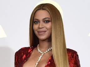 FILE - In this Feb. 12, 2017 file photo, Beyonce poses in the press room at the 59th annual Grammy Awards in Los Angeles.  Beyonce has released a soundtrack to her Netflix documentary "Homecoming," called "Homecoming: The Live Album." The documentary explores Beyonce's historic performances at the 2018 Coachella Valley Music and Arts Festival. She was the first black woman to headline the event in which she paid tribute to America's historically black colleges.