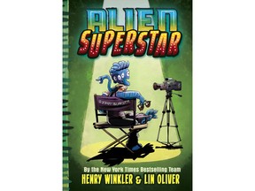 This cover image released by Abrams shows "Alien Superstar," by Henry Winkler and Lin Oliver. Winkler is planning an out-of-this-world take on fame and show business. The 73-year-old actor known for "Happy Days" and "Barry" has a three-book deal with Abrams Children's Books for a middle-grade series about an alien who somehow lands in Hollywood and becomes a teen sensation. The series is called "Alien Superstar" and will be co-written with Lin Oliver and illustrated by Ethan Nicolle. The first book is scheduled for Oct. 1, Abrams announced Monday, April 22, 2019. (Abrams via AP)