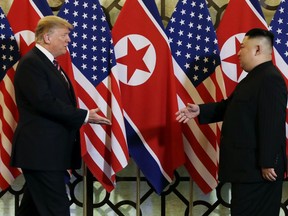 FILE - In this Feb. 27, 2019, file photo, President Donald Trump meets North Korean leader Kim Jong Un in Hanoi. North Korea has test-fired a "new-type tactical guided weapon," its state media announced Thursday, April 18, a move that could be an attempt to register the country's displeasure with currently deadlocked nuclear talks with the United States without causing those coveted negotiations to collapse.