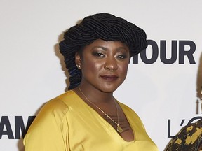 FILE - In this Nov. 14, 2016, file photo, Alicia Garza, co-founders of the Black Lives Matter movement, arrives at the Glamour Women of the Year Awards at NeueHouse Hollywood in Los Angeles. Garza and two other women of the nation's most influential activists are launching a new organization that aims to harness the political power of women to influence elections and shape local and national policy priorities.