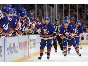 New York Islanders right wing Jordan Eberle shouts as he skates by the bench after scoring a goal against the Pittsburgh Penguins during the third period of Game 2 of an NHL hockey first-round playoff series, Friday, April 12, 2019, in Uniondale, N.Y. The Islanders won 3-1.