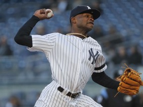 New York Yankees pitcher Domingo German delivers against the Detroit Tigers during the first inning of a baseball game, Monday, April 1, 2019, in New York.