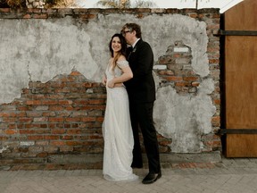 In this Saturday, April 20, 2019, photo provided by Katch Silva, Michelle Branch and Patrick Carney pose for a photo in New Orleans. The Grammy-winning musicians tied the knot Saturday at the Marigny Opera House in front of close friends and family, a representative for Carney told The Associated Press on Sunday.