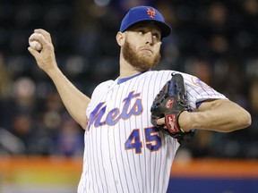New York Mets' Zack Wheeler delivers a pitch during the first inning of a baseball game against the Cincinnati Reds, Monday, April 29, 2019, in New York.