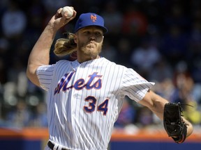 New York Mets starting pitcher Noah Syndergaard throws to the Washington Nationals during the first inning of a baseball game Thursday, April 4, 2019, in New York.