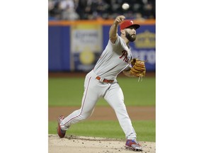 Philadelphia Phillies' Jake Arrieta delivers a pitch during the first inning of a baseball game against the New York Mets, Monday, April 22, 2019, in New York.