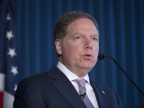 Geoffrey S. Berman, U.S. Attorney for the Southern District of New York, speaks during a news conference announcing charges against Rochester Drug Co-Operative Laurence Doud III, Tuesday, April 23, 2019, in New York. The former head of a drug distributor has been indicted on what federal prosecutors say are the first-ever criminal charges against a drug company executive stemming from the opioid crisis.