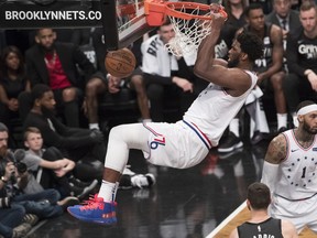 Philadelphia 76ers center Joel Embiid dunks during the second half of Game 4 of a first-round NBA basketball playoff series against the Brooklyn Nets, Saturday, April 20, 2019, in New York.