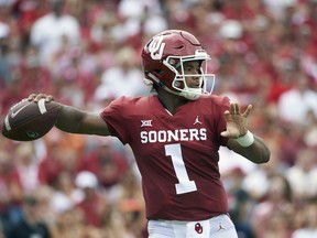 FILE - In this Oct. 6, 2018, file photo, Oklahoma quarterback Kyler Murray (1) throws a pass against Texas during the first half of an NCAA college football game at the Cotton Bowl, in Dallas. Murray is a possible pick in the 2019 NFL Draft.