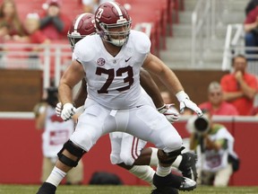 FILE - In this Oct. 6, 2018, file photo, Alabama offensive lineman Jonah Williams sets up to block against Arkansas in the second half of an NCAA college football game, in Fayetteville, Ark. Williams is a possible in the 2019 NFL Draft.