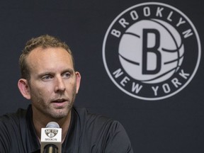 FILE - This June 18, 2018, file photo shows Brooklyn Nets General Manager Sean Marks during a news conference introducing the team's draft picks in New York. NBA League Operations president Byron Spruell said Marks will serve a one-game suspension and be fined $25,000 for entering the referees' locker room after Game 4 of the Nets-76ers playoff series Saturday.